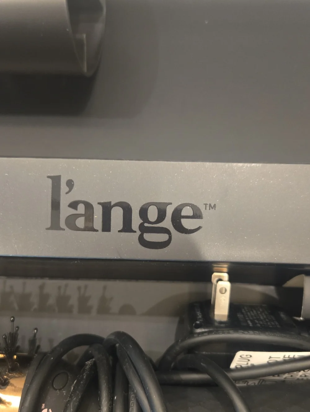 Lange black and gold styling tool